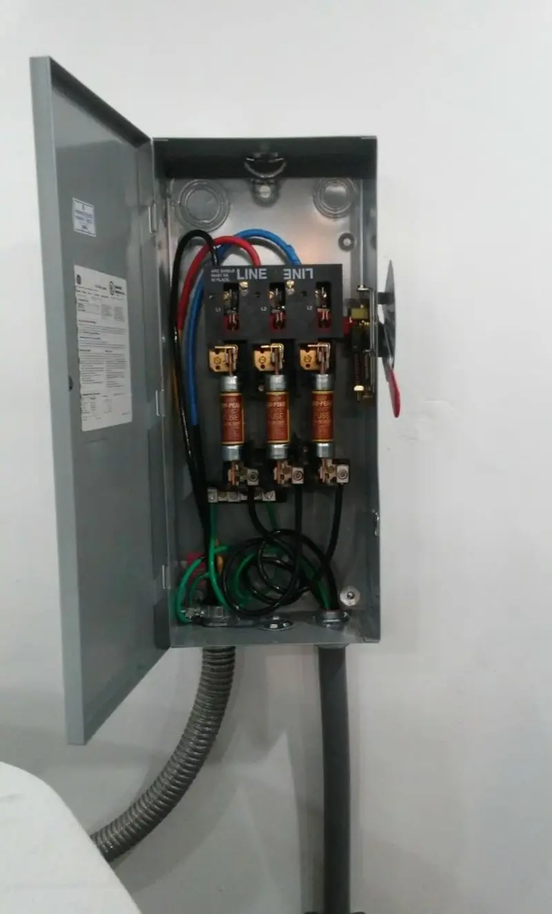Three-phase disconnect switch installed for Smoke Detector Installation in Surrey