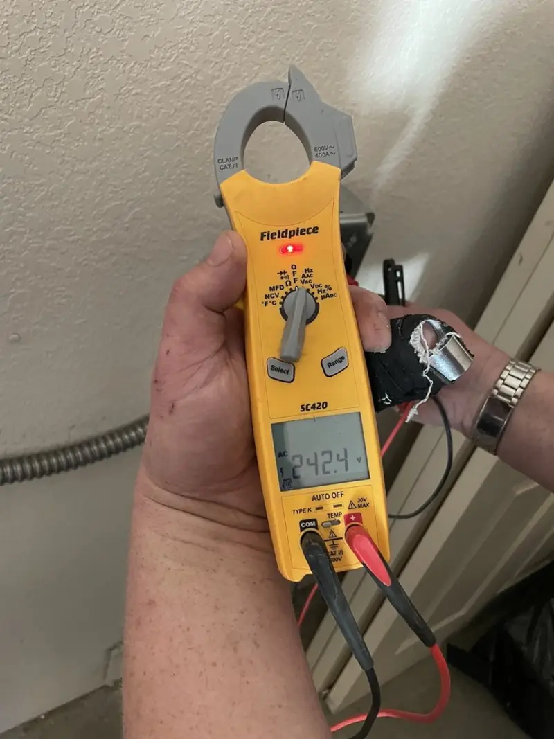Voltage testing with clamp meter during Generator Installation in Surrey